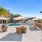 pool with nearness to property and ample shade from covering trees and with reclining seats