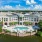 aerial view of pool and courtyard showing surrounding landscaping