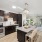 kitchen with an island, modern appliances and spacious counter-space